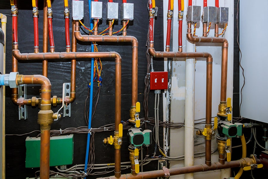 Complex plumbing and electrical system installation.